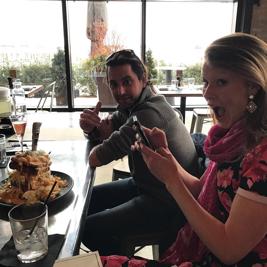 Adam enjoying a restaurant outing with company