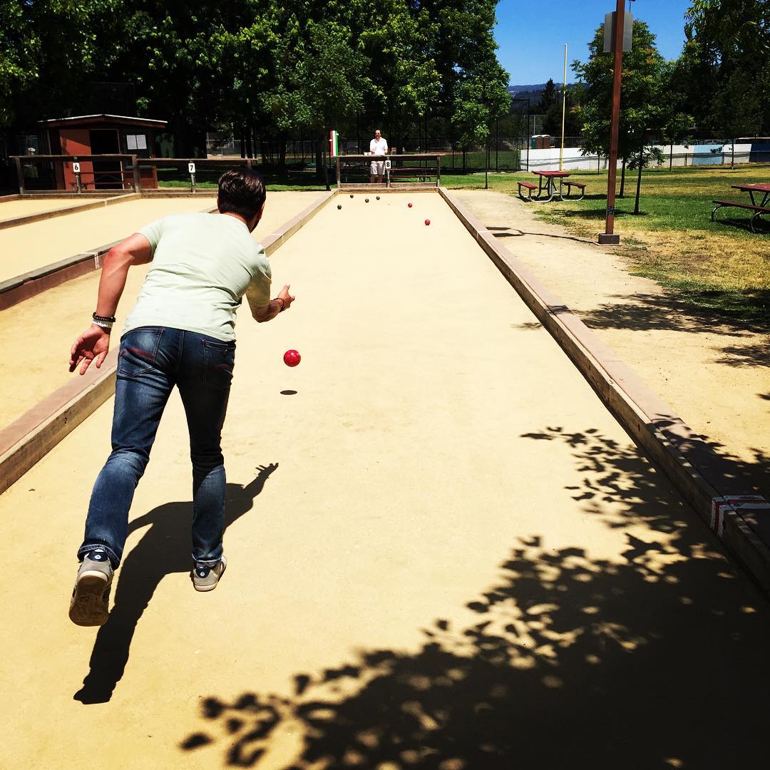Adam playing bocce outdoors